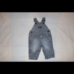 Baby blue and white striped overalls.